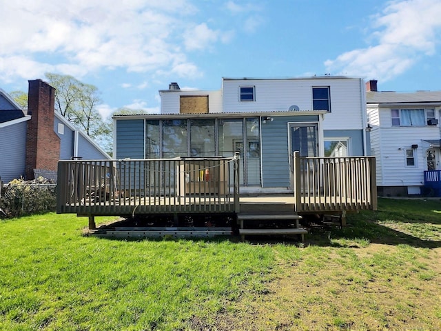 141 Arcadia Ave, Bridgeport, CT 06604 - back of house featuring a wooden deck, a yard, and a chimney