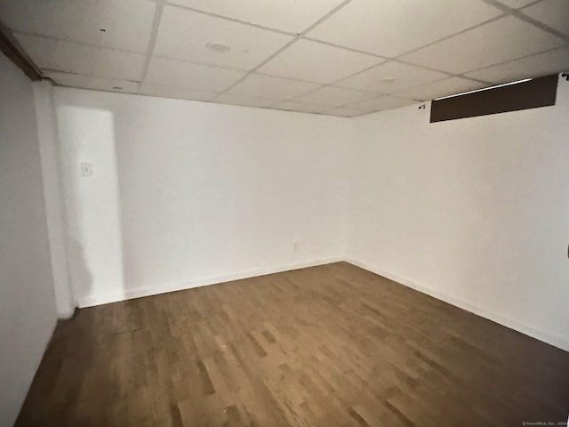 141 Arcadia Ave, Bridgeport, CT 06604 - finished below grade area with baseboards, a drop ceiling, and wood finished floors