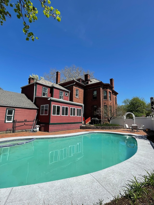 pool featuring a patio area