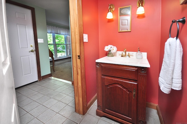 1123 Windsor Ave, Windsor, CT 06095 - bathroom featuring tile patterned floors, baseboards, and vanity