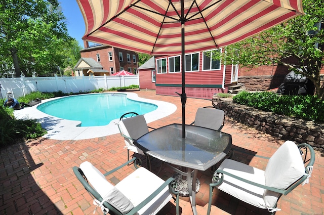 1123 Windsor Ave, Windsor, CT 06095 - view of pool with entry steps, a fenced backyard, a patio, and outdoor dining area