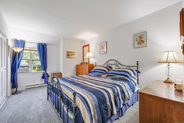 bedroom featuring cooling unit, baseboard heating, and carpet floors