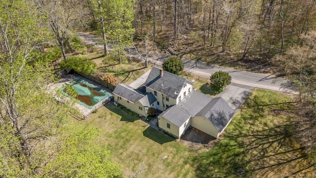 aerial view with a wooded view