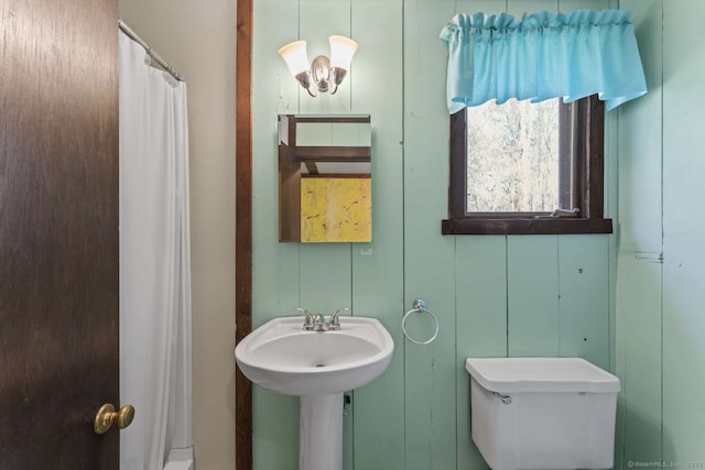 full bath with a sink and toilet