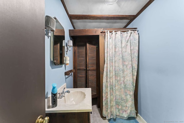 full bathroom with vanity and a shower with shower curtain