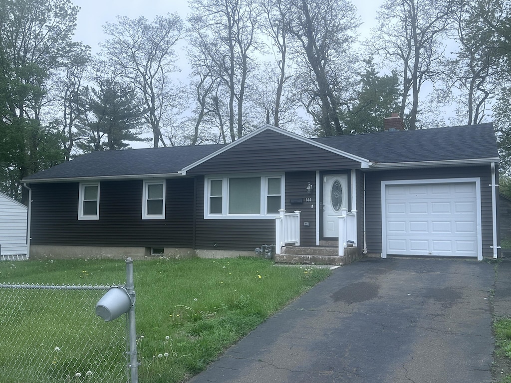 144 Thomaston St, Hartford, CT 06112 - ranch-style home featuring a garage, a front lawn, a chimney, asphalt driveway, and a shingled roof