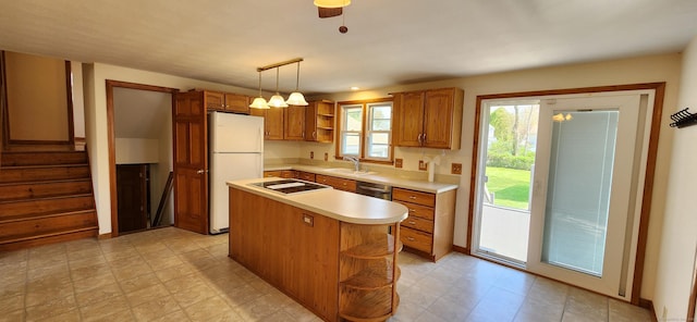 116 Aimes Dr, West Haven, CT 06516 - kitchen with open shelves, freestanding refrigerator, brown cabinets, a sink, and dishwasher