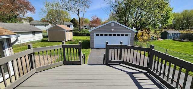 116 Aimes Dr, West Haven, CT 06516 - wooden deck featuring a residential view, a detached garage, a shed, an outdoor structure, and a yard