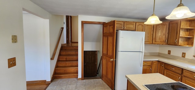 116 Aimes Dr, West Haven, CT 06516 - kitchen with brown cabinetry, freestanding refrigerator, open shelves, light countertops, and stovetop