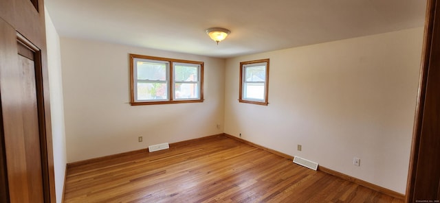 116 Aimes Dr, West Haven, CT 06516 - unfurnished bedroom featuring baseboards, visible vents, and light wood-style flooring
