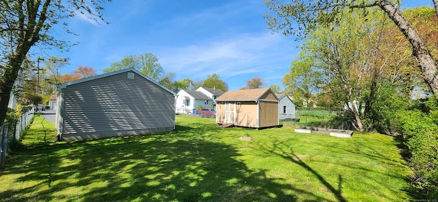 116 Aimes Dr, West Haven, CT 06516 - view of yard with a storage unit, an outdoor structure, and fence private yard