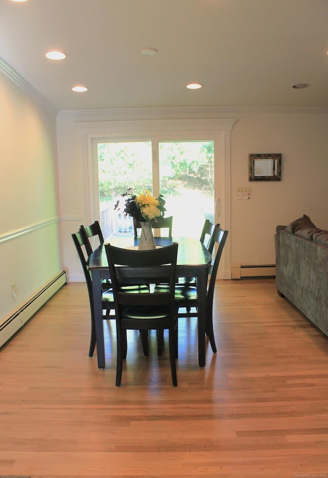 62 Wood Ridge Dr, Stamford, CT 06905 - dining space featuring plenty of natural light, ornamental molding, baseboard heating, and light wood-style flooring