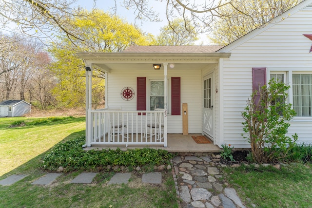 23 Strosberg Rd, Waterford, CT 06385 - exterior space with a lawn, a porch, and roof with shingles