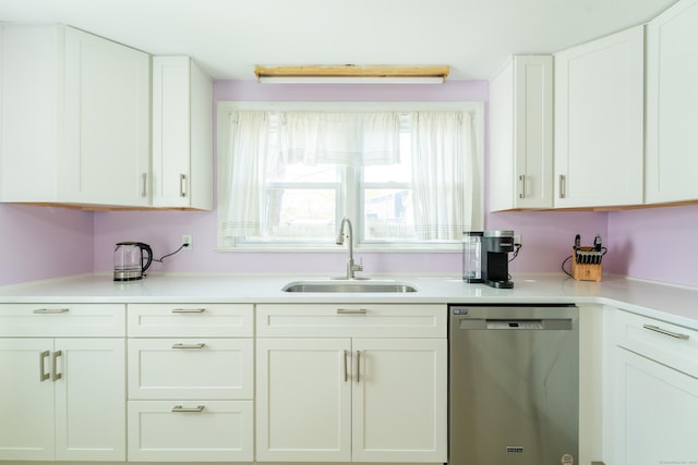 23 Strosberg Rd, Waterford, CT 06385 - kitchen with a sink, light countertops, white cabinets, and stainless steel dishwasher