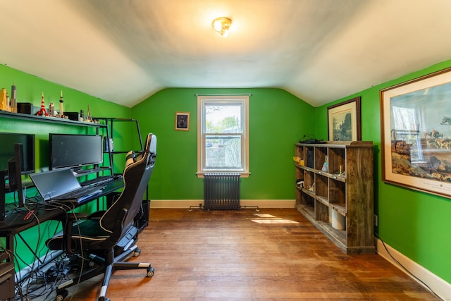 23 Strosberg Rd, Waterford, CT 06385 - office area featuring wood-type flooring, radiator, baseboards, and vaulted ceiling