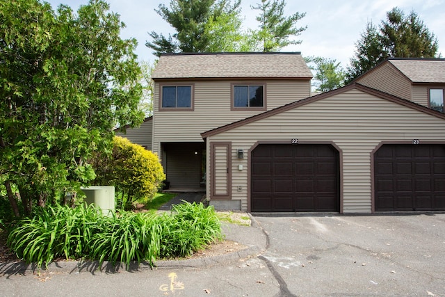 22 Maple Ln Unit 22, Avon, CT 06001 - traditional home featuring an attached garage and asphalt driveway