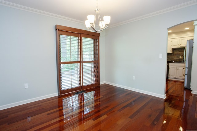 22 Maple Ln Unit 22, Avon, CT 06001 - unfurnished room featuring arched walkways, a chandelier, crown molding, dark wood-style floors, and baseboards