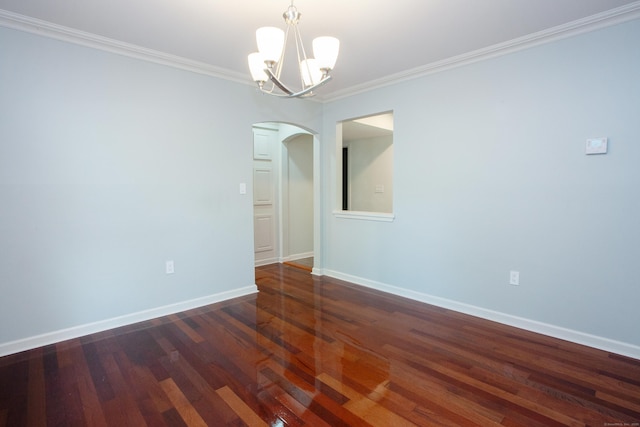 22 Maple Ln Unit 22, Avon, CT 06001 - unfurnished room featuring arched walkways, a chandelier, crown molding, baseboards, and dark wood-style floors