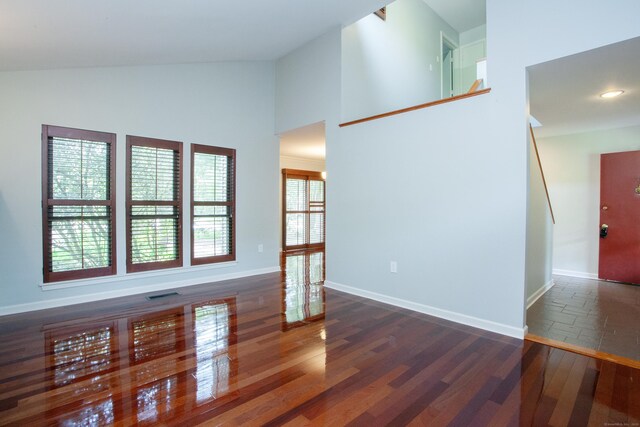 22 Maple Ln Unit 22, Avon, CT 06001 - empty room with high vaulted ceiling, wood finished floors, and baseboards