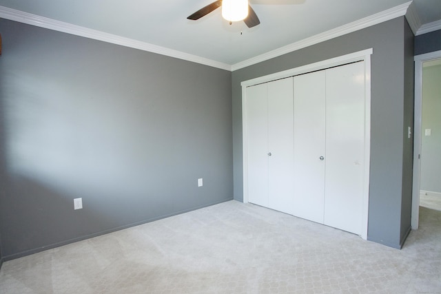 22 Maple Ln Unit 22, Avon, CT 06001 - unfurnished bedroom featuring crown molding, carpet flooring, a closet, and baseboards