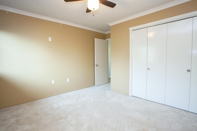 22 Maple Ln Unit 22, Avon, CT 06001 - unfurnished bedroom with crown molding, light carpet, a closet, a ceiling fan, and baseboards