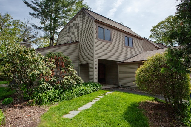 22 Maple Ln Unit 22, Avon, CT 06001 - rear view of property featuring roof with shingles and a yard