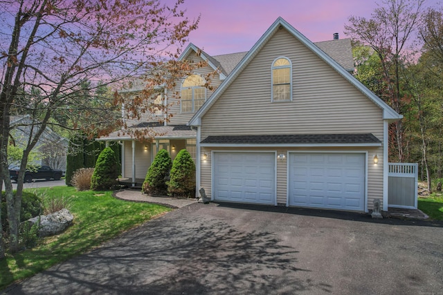 85 Chippenwood Ln, Bristol, CT 06010 - traditional-style home with an attached garage, a shingled roof, and driveway