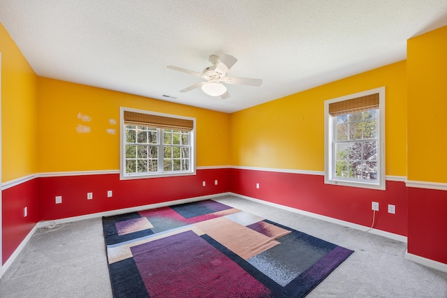 85 Chippenwood Ln, Bristol, CT 06010 - carpeted empty room with baseboards, a ceiling fan, a textured ceiling, and visible vents