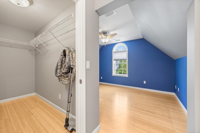 85 Chippenwood Ln, Bristol, CT 06010 - walk in closet with visible vents, a ceiling fan, wood finished floors, and lofted ceiling
