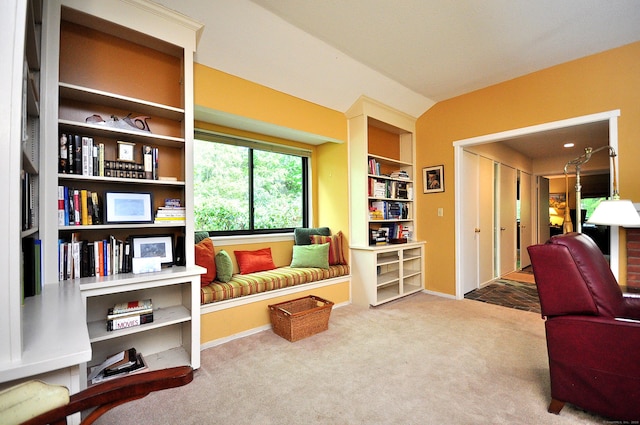 sitting room with carpet and baseboards