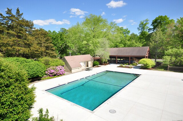 swimming pool featuring a patio