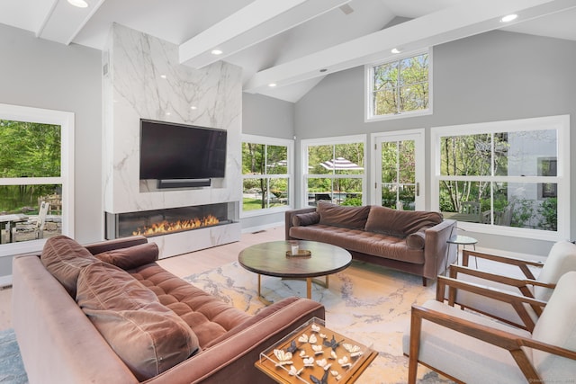 1580 Ponus Rdg, New Canaan, CT 06840 - living area featuring recessed lighting, a premium fireplace, wood finished floors, high vaulted ceiling, and baseboards