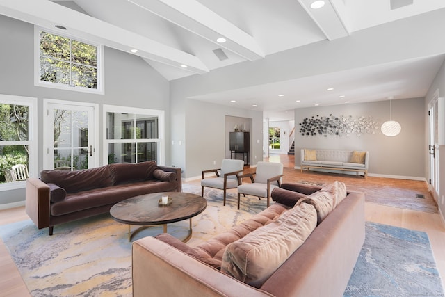 1580 Ponus Rdg, New Canaan, CT 06840 - living room with recessed lighting, light wood-style flooring, plenty of natural light, beam ceiling, and baseboards
