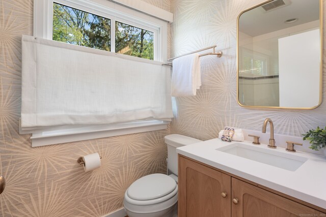 1580 Ponus Rdg, New Canaan, CT 06840 - bathroom with toilet, tile walls, and vanity