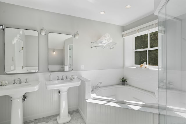 1580 Ponus Rdg, New Canaan, CT 06840 - full bath featuring a garden tub, wainscoting, a sink, and recessed lighting