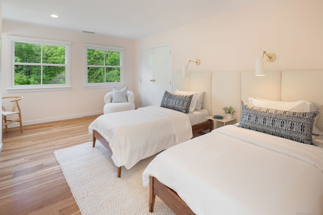 1580 Ponus Rdg, New Canaan, CT 06840 - bedroom with light wood finished floors and baseboards