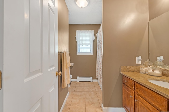 full bath with vanity, toilet, tile patterned floors, baseboards, and a baseboard heating unit