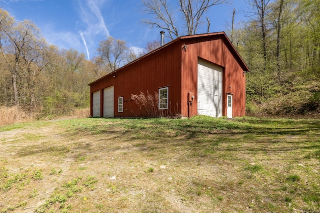 view of outbuilding with an outbuilding