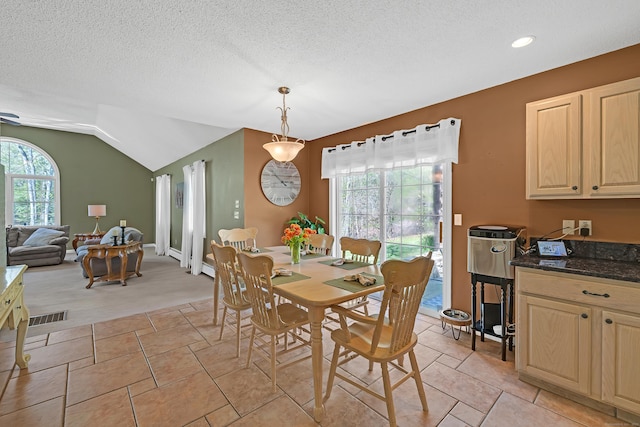 dining space featuring lofted ceiling, recessed lighting, a textured ceiling, and visible vents