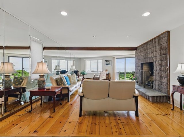 919 Pequot Ave, New London, CT 06320 - living room featuring light wood-style flooring, a fireplace, and recessed lighting