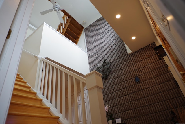 919 Pequot Ave, New London, CT 06320 - stairs with a ceiling fan and recessed lighting