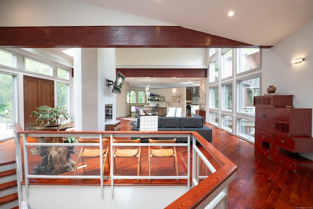 88 Green Ln, Ridgefield, CT 06877 - living room with wood finished floors, lofted ceiling, a fireplace, and recessed lighting