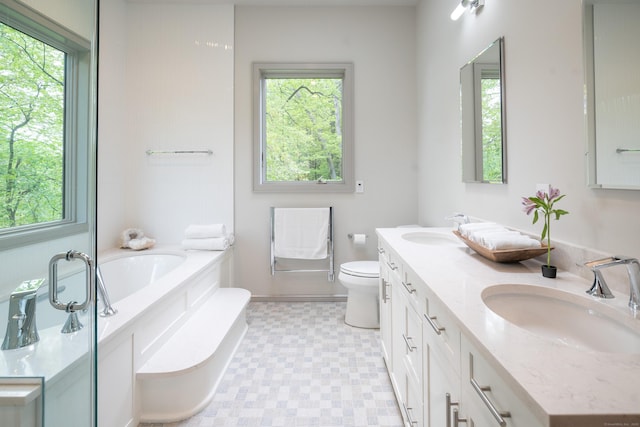 88 Green Ln, Ridgefield, CT 06877 - bathroom with tile patterned floors, a garden tub, and double vanity