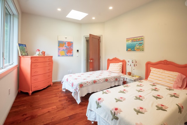 88 Green Ln, Ridgefield, CT 06877 - bedroom with a skylight, wood finished floors, multiple windows, and recessed lighting