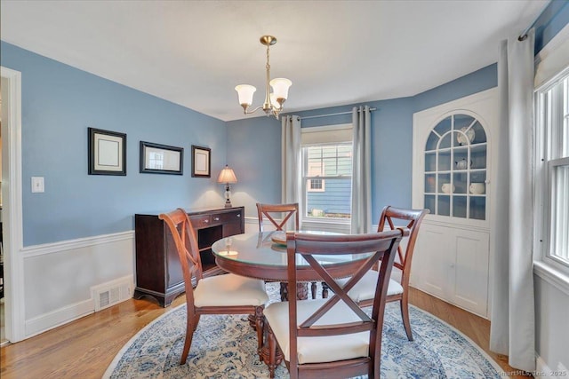 404 Brimfield Rd, Wethersfield, CT 06109 - dining room with a chandelier and wood finished floors