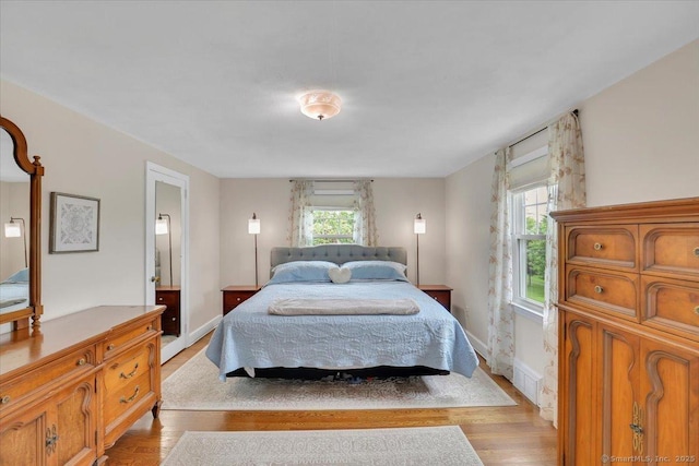 404 Brimfield Rd, Wethersfield, CT 06109 - bedroom featuring light wood finished floors and baseboards
