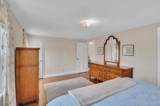 404 Brimfield Rd, Wethersfield, CT 06109 - bedroom with wood finished floors and baseboards