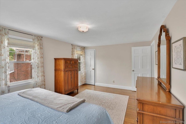 404 Brimfield Rd, Wethersfield, CT 06109 - bedroom featuring wood finished floors and baseboards