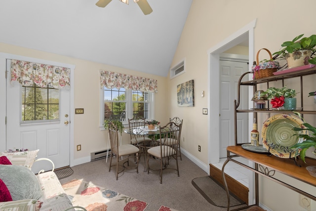 carpeted dining room featuring a ceiling fan, visible vents, baseboards, and baseboard heating