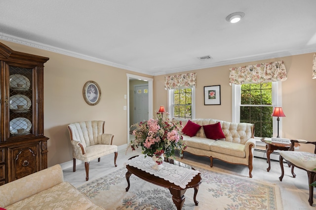 living area featuring ornamental molding, visible vents, and a baseboard heating unit